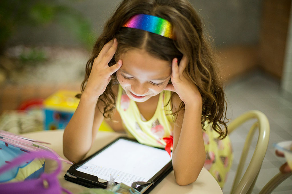 child using an ipad